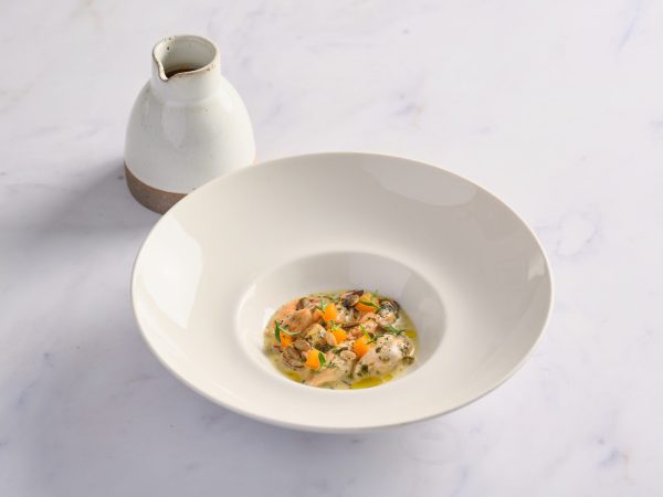 Seasonal broth served with vegetables at Wild Honey St James