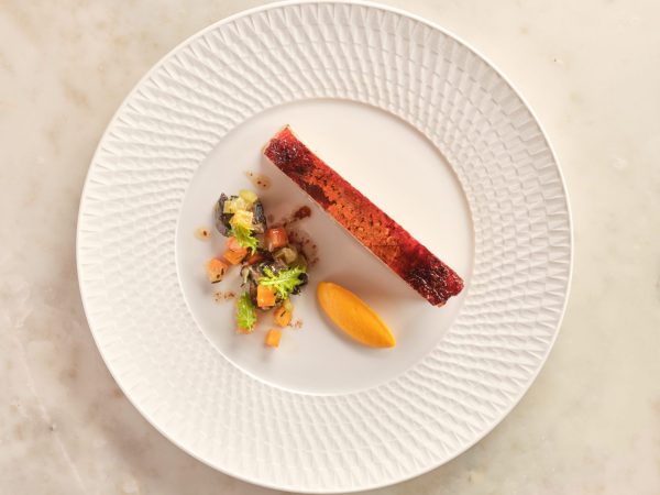 Fine dining salmon dish presentation